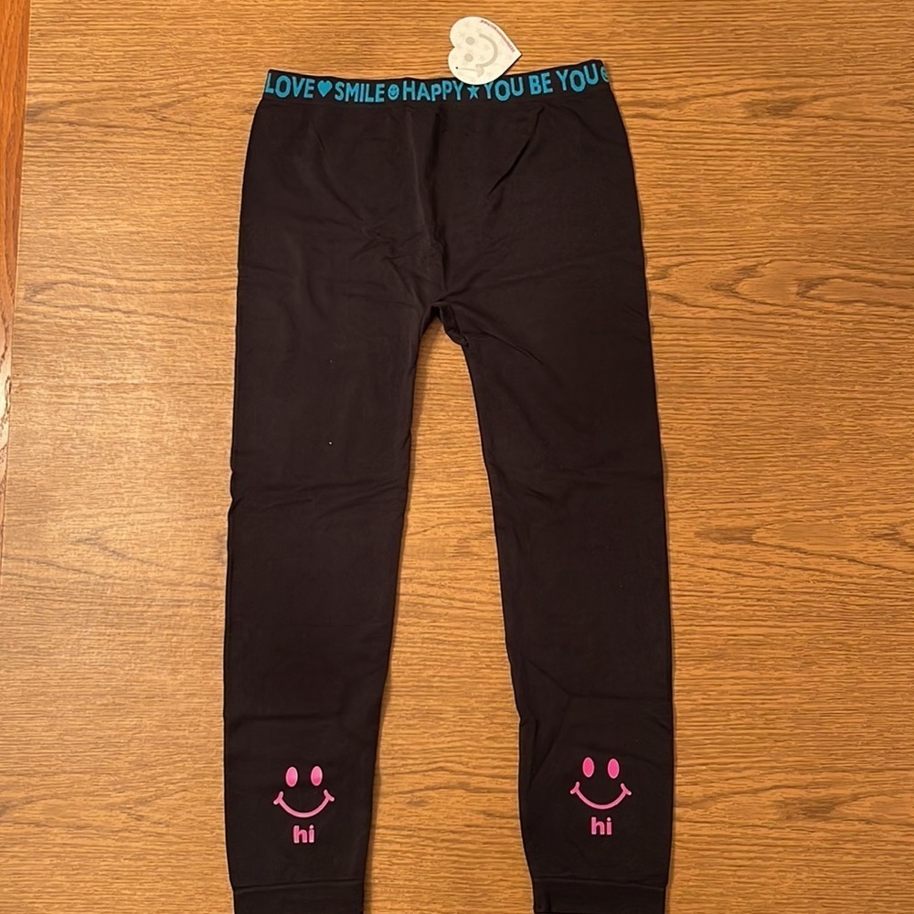 Two pair of little miss matched leggings. - Picture 6 of 11